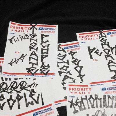 IPxOS-Priority-Stickers-T-Shirt-black-detail2.jpg