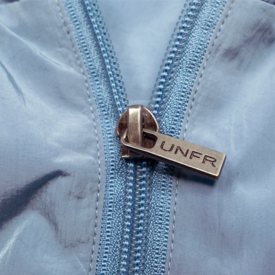 Unfair-Athletics-Track-jacket-bluegrey-Windrunner-detail1.jpg