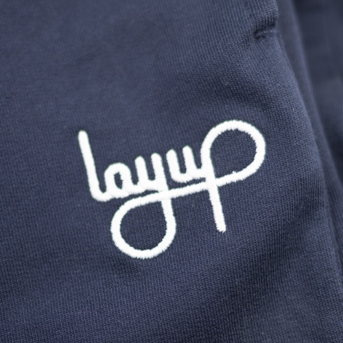 layup-sweatpants-dark-navy-logo-embroidery-detail-1.jpg